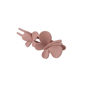 Detail of matte pink butterfly hair claw clip with strong spring and anti-slip teeth