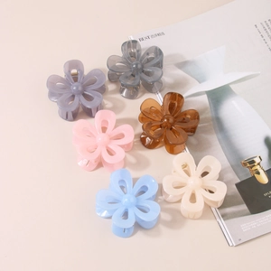 7cm hollow flower resin hair claw clips set in six pastel colors for elegant hair styling