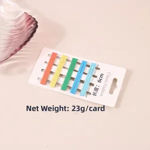 Close-up of 15 pieces colorful 6cm candy color bobby pins set on a display card