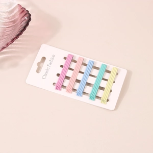Set of 20 matte macaron color bobby pins in pink, blue, and green on display card