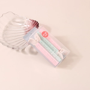 Set of pink and green hair roller pins for air bangs and high cranial top styling