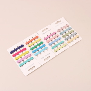 Colorful wave-shaped hair clips set in vibrant candy colors for daily hair styling