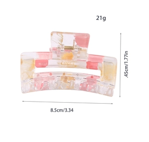 Detailed view of rectangle gold foil hair claw clip with size and weight parameters
