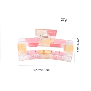 Detail view of a 10.5cm rectangle resin hair claw clip with colorful oil painting patterns