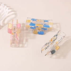 Three-piece geometric clear acrylic hair claws with gold foil and colorful blocks set