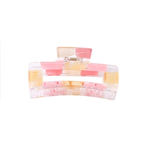 Transparent acrylic hair claw clip with colorful oil paint strokes and gold spring
