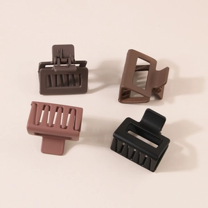Set of four 5cm matte square claw clips in black, brown, caramel, and pink colors