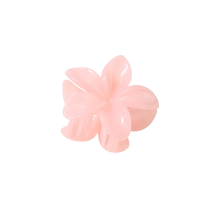 Détail de la pince à cheveux fleur rose de 8 cm en résine avec finition mate