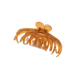 Minimalist translucent amber large hair claw clip with heart shaped handle on white background