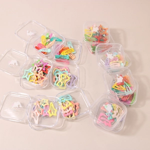 Colorful star and wavy metal hair clips for kids in various macaron candy colors