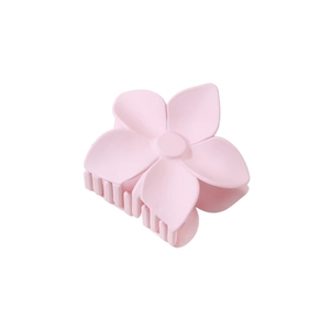 Close-up of matte petal hair claw clip in soft pink finish for elegant hair styling