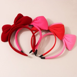 Three-piece set of velvet bow headbands in deep red and pink shades for kids