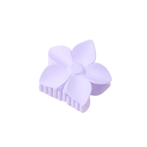 Macro view of light purple matte flower hair claw clip with serrated teeth design