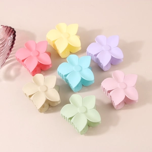 Matte macaron-colored flower hair claws set in seven vibrant pastel colors for women