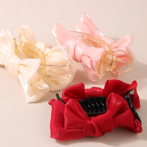 Pinces à cheveux élégantes avec nœuds en résille en beige, rose et rouge pour chignons