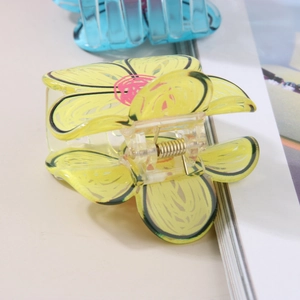 Cute Korean yellow flower hair claw clip with hand-painted details and metal spring