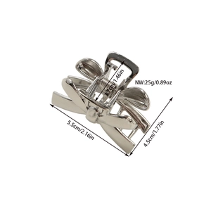 Elegant silver alloy bow hair claw clip with a polished finish for a minimalist style