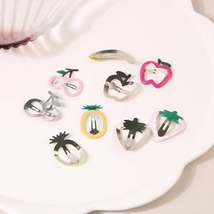 Exquisite fruit-shaped metal BB hair clips with colorful enamel finish on a white tray