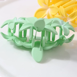 Elegant mint green frangipani flower hair claw clip with matte finish for women
