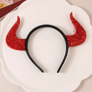 Halloween red sequin devil horn headband for party decoration on a white tray