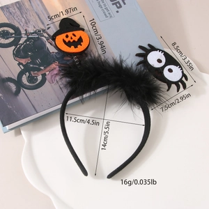 Detail view of Halloween headband with pumpkin and spider icons on a white tray