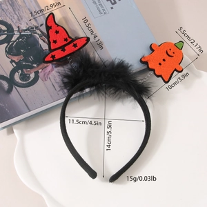 Detailed view of Halloween headband with black feathers, witch hat and pumpkin decorations