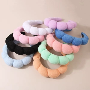 Thick padded puff headbands for women in multiple soft colors and velvet texture