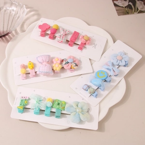 Set mit 20 bonbonfarbenen Haarspangen aus Stoff mit Blumen- und Schleifendesign