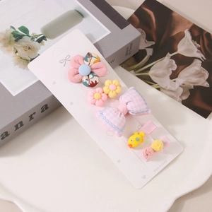 Detail von 5-teiligem Kinder-Haarclip-Set mit süßen Stoffschleifen- und Blumenmotiven