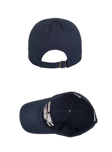Detail view of navy cotton baseball cap showing metal buckle and eagle embroidery