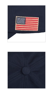 Detailed embroidery of American flag and premium stitching on navy blue baseball cap