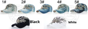 Detailed embroidery and rhinestone accents on various washed denim baseball caps