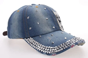 Distressed blue denim baseball cap with owl rhinestone studs and silver rivets