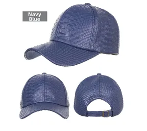 Detail of navy blue baseball cap with faux crocodile skin texture and adjustable strap