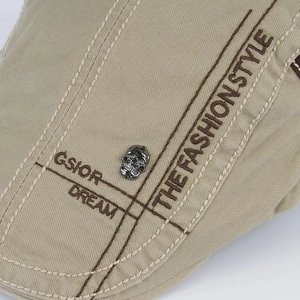 Khaki cotton canvas flat cap with fashion embroidery and a metal skull detail