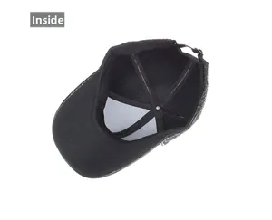 Detail view of the black baseball cap's inner mesh lining and metal buckle closure