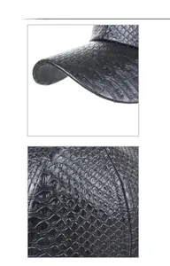 Close-up detail showing the glossy embossed crocodile texture on the PU leather baseball cap