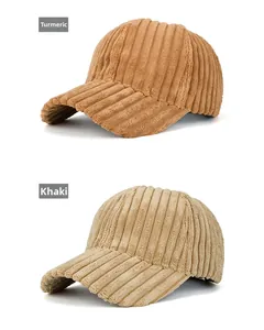 Detailed texture of striped corduroy baseball caps in ginger and khaki colors