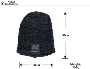 Detail view of dark grey knitted beanie showing 30cm height and 22cm width dimensions