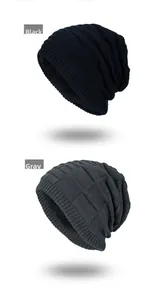 Detail view of knitted beanie hats in black and grey with warm fleece lining and textures