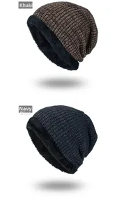 Detail view of khaki and navy winter beanies with thick knit texture and fleece lining