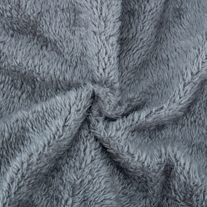 Close-up of soft grey fleece lining texture on a thick winter knit beanie for men