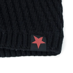 Black knit beanie with red star patch featuring textured diamond wave knit pattern