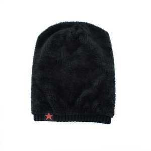 Winter thermal knit beanie hat with fuzzy texture and a red star emblem in black color