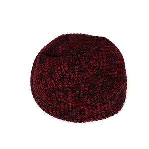 Winter thermal knit beanie hat with mixed red and black yarn texture for outdoors