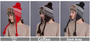 Winter knitted trapper hats with earflaps, jacquard pattern, pom-pom and tassels in three colors