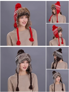 Detailed view of winter trapper hat with knit patterns and faux fur lining accents