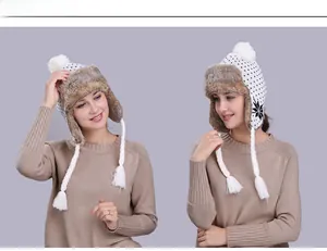 Winter aviator hat with snowflake patterns, plush faux fur lining and braided tassels