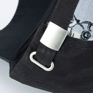 Rear view of black cotton baseball cap showing adjustable silver metal buckle and strap