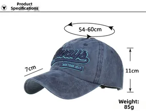 Close-up showing Always New York City 3D embroidery on blue washed cotton baseball cap